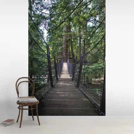 Фотообои Навесной мост в хвойном лесу, арт. 44186, пример фотообоев на стене